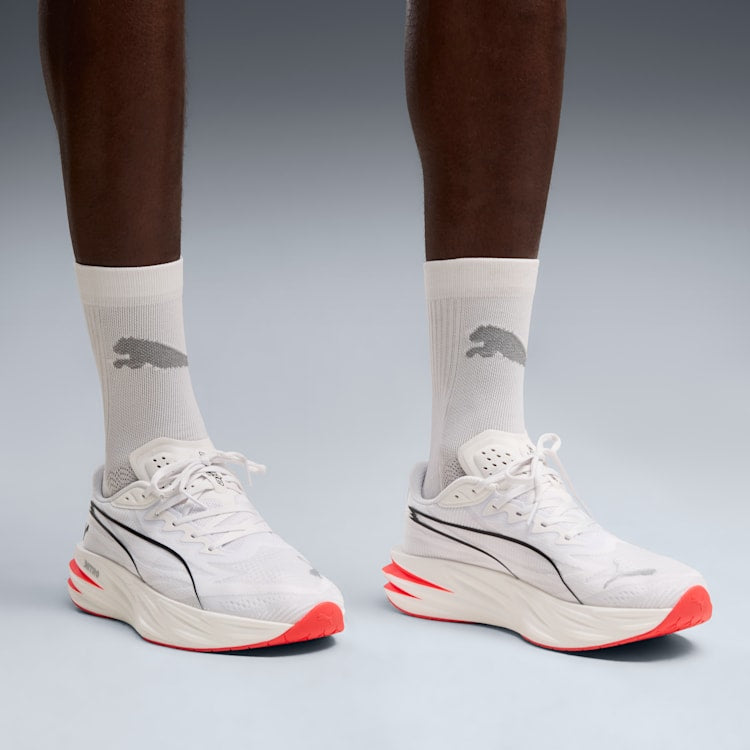 Aerodynamic White Sports Shoes with Red Sole Detail