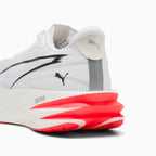 Aerodynamic White Sports Shoes with Red Sole Detail